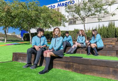 Mango Students sat on steps
