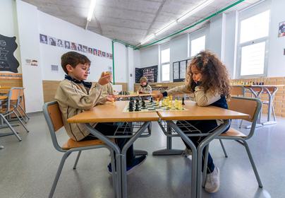 Magno Students Playing Chess